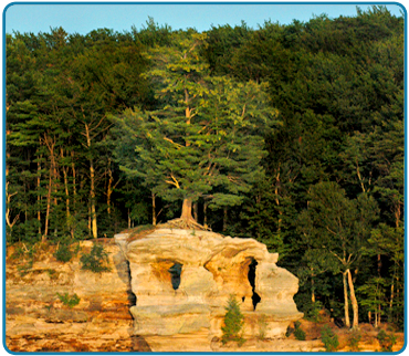 Chapel Rock is located 15 miles east of Munising off Alger County Road H-58, then about 5 miles north to the end of Chapel Road, then there is a 2 1/2 mile hike to this beautiful formation.  